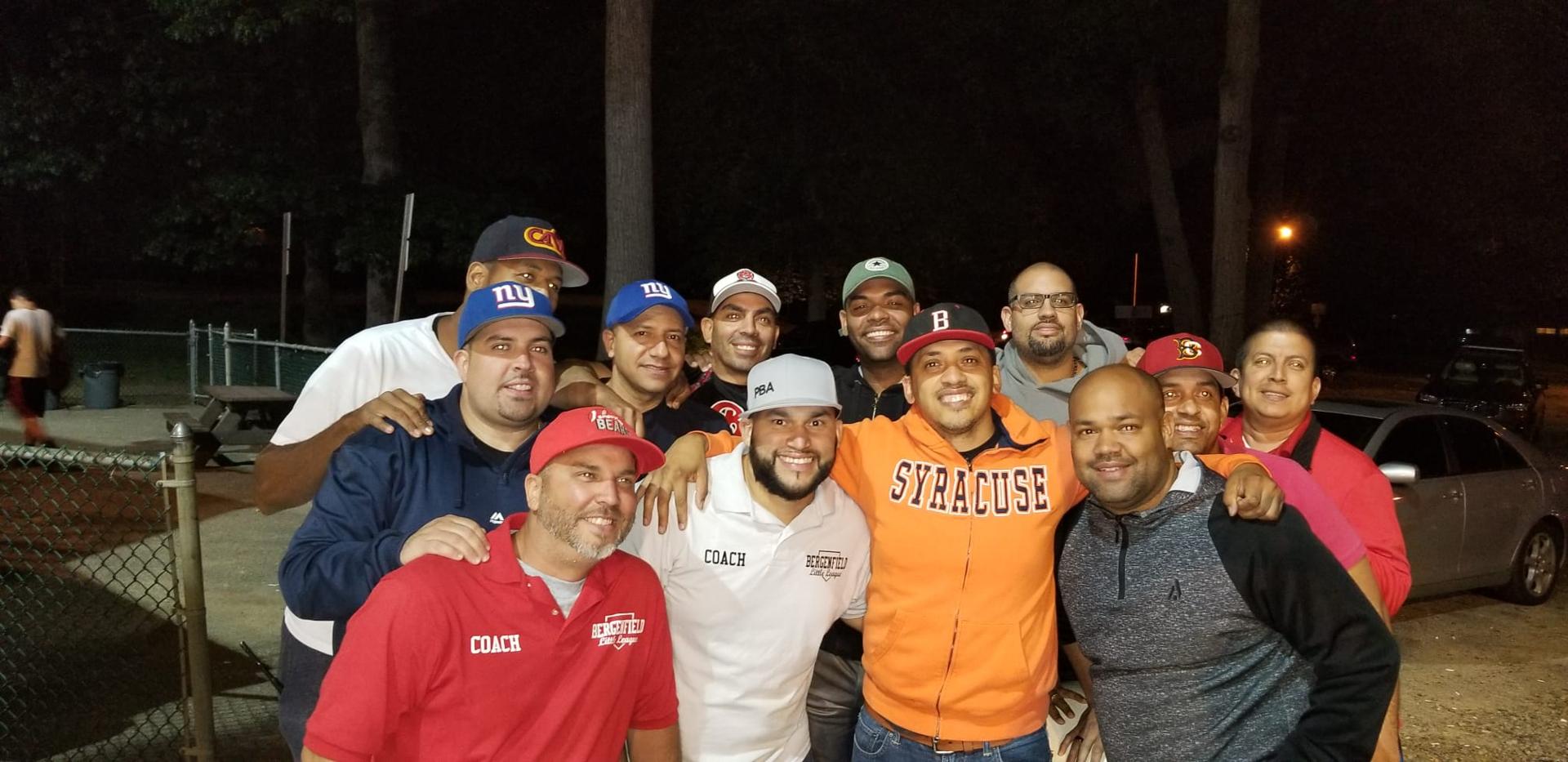 Henry Alberto sharing a night with members of The Brotherhood Dominoes Club